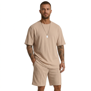 Conjunto de Punto de 2 Piezas Unisex Premium, Manga Corta, Cuello en V, Corte Holgado, Color Sólido, Atuendo Casual de Verano, Pantalones Cortos hasta la Rodilla, 95% Algodón, Estampado - Product Image 3