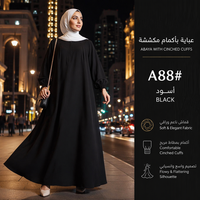 Robe longue minimaliste légère en tissu froissé avec buste froncé et manches longues à revers, coupe trapèze |   Abaya décontractée ample pour musulmanes au quotidien
