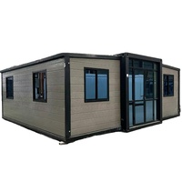 Villa préfabriquée de luxe à double aile extensible, en conteneur, avec structure en acier, panneaux de bardage étanches, climatisation personnalisée pour hôtel et appartement
