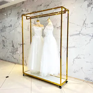 Magasin de mariage Commercial, magasin de décorations Boutique de vêtements en métal doré, présentoir de vêtements en or, vitrine de robe de mariée