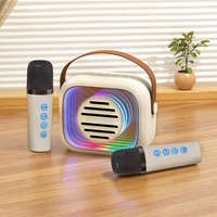 Nouveau haut-parleur karaoké mini 7W avec lumières LED RVB, connectivité sans fil intégrée, 2 micros pour intérieur et extérieur / Cadeau pour enfants YF93