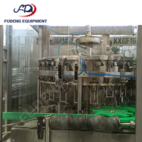 Machine de remplissage à haute capacité 8500 bph contrôlée par PLC pour bouteilles en verre avec bouchon ROPP, bière, soda, vin, prix compétitif, usage industriel