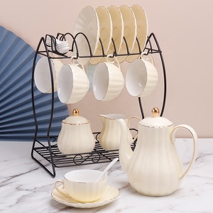 21-teiliges Elegantes Kürbis-Keramik-Teeservice mit Untertassen, Milch- und Zuckerdosen, Teekanne und Metallständer für Nachmittagstee und Kaffee - Product Image 5