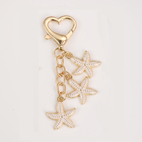 Porte-clés en alliage personnalisé avec pendentif en forme de cœur d'étoile de mer coloré de dessin animé, petit cadeau promotionnel