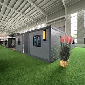 <span class=keywords><strong>Appartement</strong></span> préfabriqué extensible à ossature métallique, contemporain, compact, prêt à l'emploi, à deux étages, avec design habitable et panneaux solaires, pour jardin. - Product Image 1