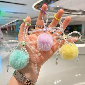 Nouveau sac à main en peluche avec pendentif boule, double bouton, perles de cristal, nœud, <span class=keywords><strong>cordon</strong></span> pour téléphone portable, automne-hiver - Product Image 3