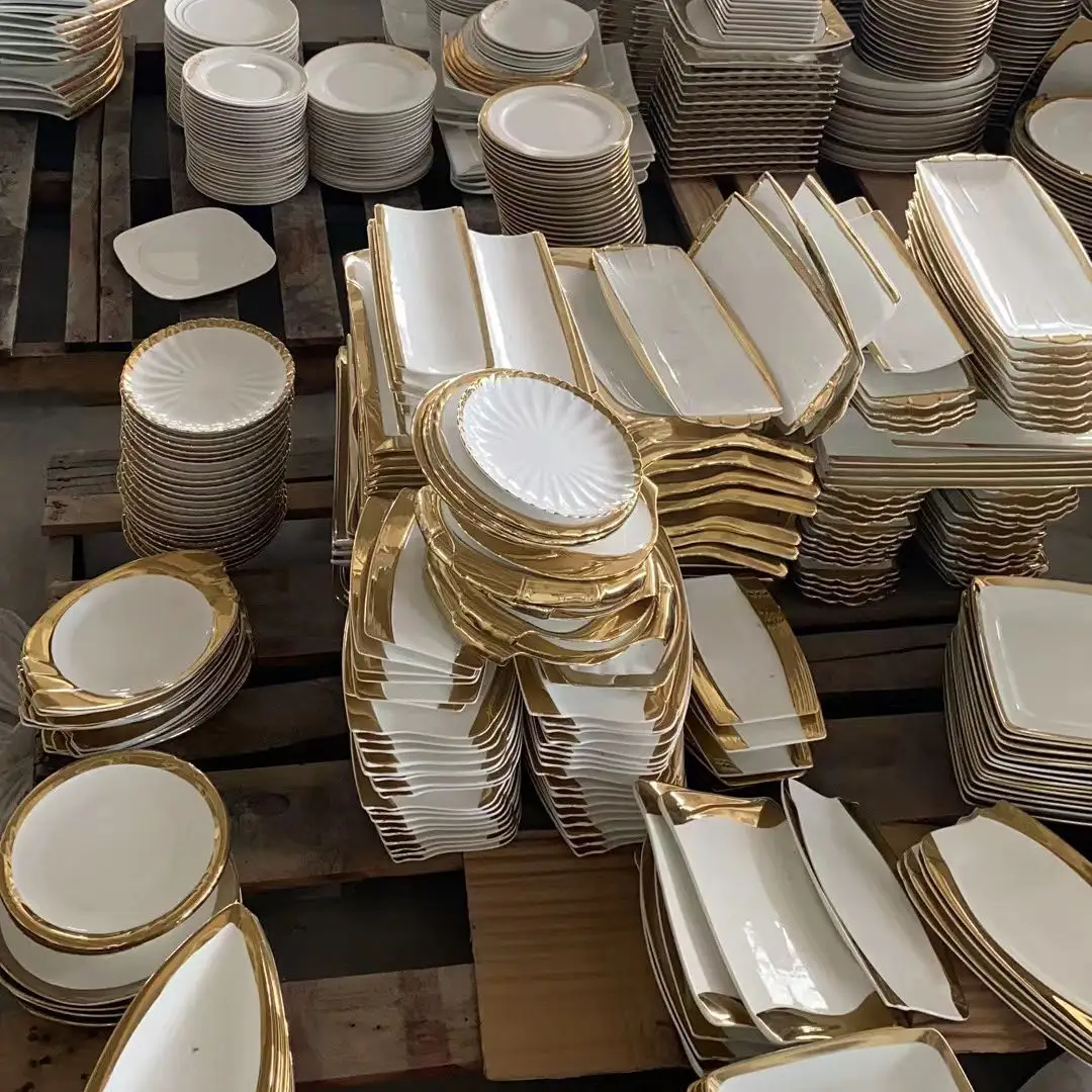 old stocked golden white ceramic luxury dinnerware cheap price sold by ton mixed packing wholesale price shipped from Chaozhou