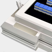 Table de Mahjong blanche en forme de tour de luxe légère télécommandée entièrement automatique avec chargeur Por