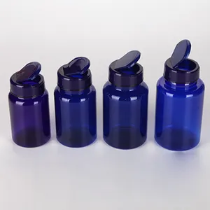 زجاجة فارغة من البلاستيك للحيوان الأليف وزجاجات كبسولات فيتامين والأدوية الصلبة الزرقاء