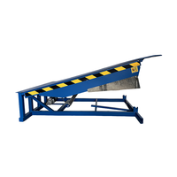 Niveleur de quai hydraulique fixe à fonctionnement sécurisé avec rampe de chargement et plateforme à rebord pour chariot élévateur