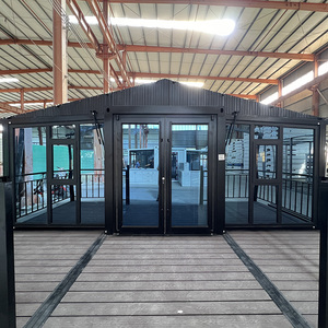 Maison de conteneur préfabriquée en acier moderne et luxueuse de 60 mètres carrés, extensible, 20x20, avec électricité solaire - Product Image 1
