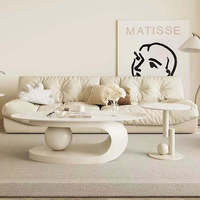 Table basse moderne de luxe italienne haut de gamme, design ovale simple avec plateau en pierre, meubles de salon pour usage domestique