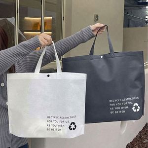 Sac fourre-tout pliable réutilisable en non-tissé de couleur unie pour femmes, fourni par l'usine - Product Image 5