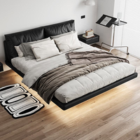 Lit flottant en cuir véritable, style italien minimaliste moderne, lit double de luxe, rembourrage en duvet, chambre principale haut de gamme