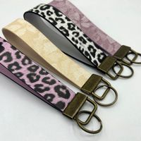 Accessoire de bijouterie imprimé léopard en métal et cuir pour femme, support de sac de voiture, pour le marché européen et américain