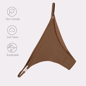 Tangas sin costuras de tela no tejida para mujer, cómodas, invisibles, con logo en la cintura, de color liso, transpirables y ecológicas. - Product Image 3