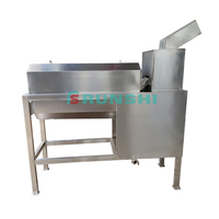 Machine de séparation de la pulpe, des pépins et des peaux de jus de fruit de la passion