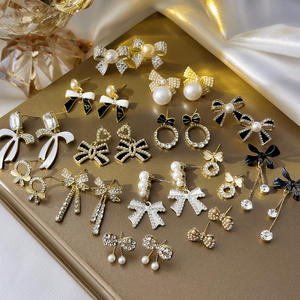 कोरियन मोती धनुष इयररिंग्स चांदी की सुई हल्के लक्जरी उच्च अंत की स्टड ईयररिंग्स गर्मियों के आला गहने महिलाओं के थोक - Product Image 1