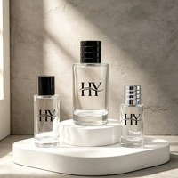 Flacon de parfum en verre transparent rond de luxe cosmétique vide avec bouchon noir 30ml 50ml 100ml