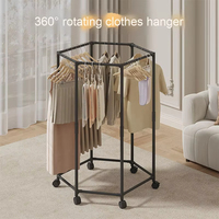 Séchoir à linge hexagonal peu encombrant en métal sur pied avec roulettes et porte-manteau rotatif