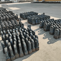 Pièces d'usure pour concasseur à marteaux à haute teneur en chrome Zhengzhou Yiwei, battes de broyeur pour applications minières, têtes de marteaux durables