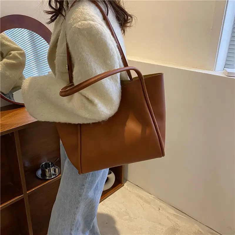 Koreanische Art reine Farbe Sub-Mutter-Paket 2022 neue einfache Handtasche Einkaufstasche High-Volume-Mode Umhängetasche