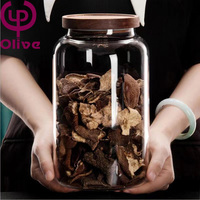 Grand bocal de rangement en verre étanche à l'humidité en bois d'acacia avec couvercle pour l'emballage des aliments et du thé.