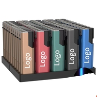 Briquet en silicone personnalisé avec logo, finition métallique mate, haut de gamme, coupe-vent, flamme bleue directe, gravé sur mesure, idéal pour un cadeau.