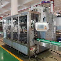 Machine de remplissage de détergent liquide 1-5 L fabriquée en usine, avec bouchonnage et scellage de bouteilles en plastique, pompe entièrement automatique pour un remplissage efficace - Offre Spéciale