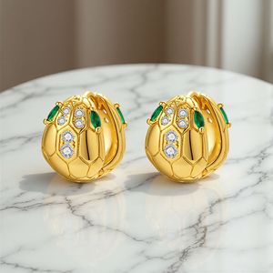 Pendientes de cabeza de serpiente chapados en oro de cobre para mujer, aretes de moda, primavera 2026, origen Yiwu EKA-043 - Product Image 1