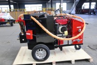 L'usine fournit une machine de réparation de nids de poule d'une capacité de 100 litres pour chaussée de route asphaltée