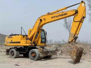 Vente Urgente : Excavatrice sur pneus HYUNDAI 210W, état quasi neuf (90%) |   Pompe hydraulique Hyundai |   Inspection OEM du moteur d'origine - Product Image 4