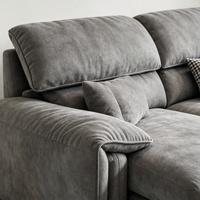 Canapé d'angle moderne en flanelle grise à trois places avec appui-tête réglable, confortable et rembourré, idéal pour salon, hôtel ou villa