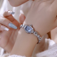 Vente directe usine – Montre à quartz haut de gamme en alliage, style rétro français, avec cadran en nacre noire naturelle et aiguilles vintage