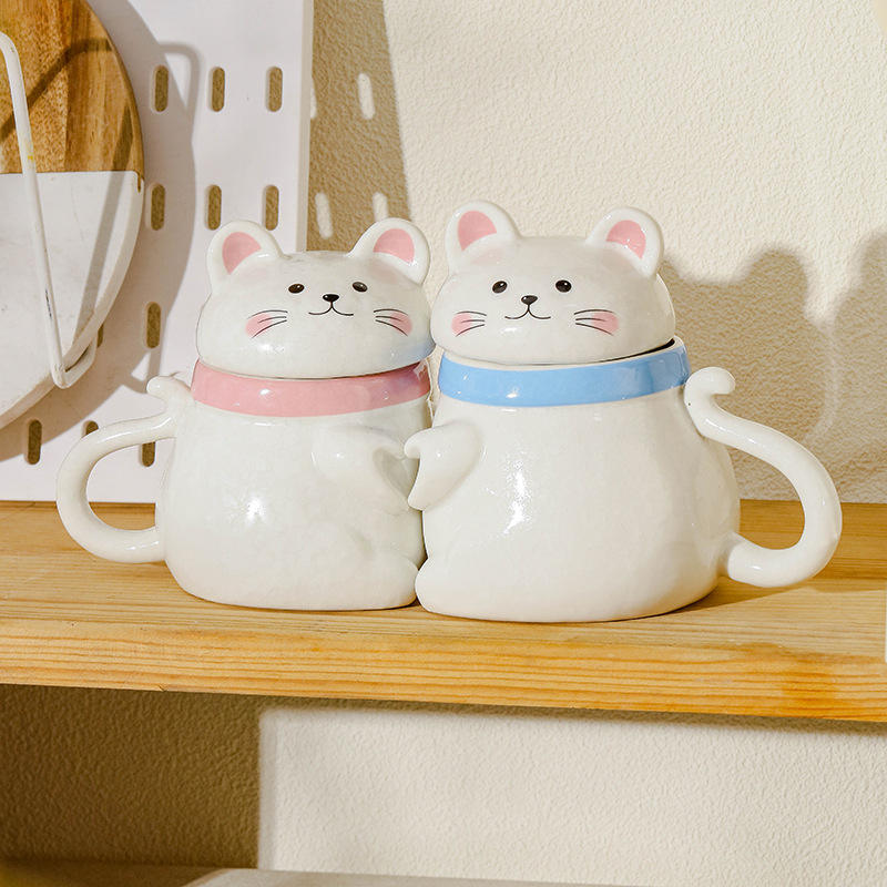 A pair of apron cat cups