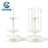 Support à pipettes en plastique CORDIAL, rond ou trapézoïdal, pour usage en laboratoire