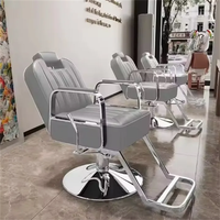 Chaise de barbier en cuir ergonomique moderne hydraulique inclinable de cheveux de coiffure pour l'usage d'école de spa de salon