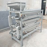 Machine de tri et de calibrage des noyaux de noix et des cacahuètes