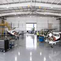 Hangar préfabriqué en structure métallique pour l'entreposage d'avions et les projets de construction aéronautique