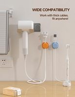 Nouveau organisateur de câble en plastique rotatif à 360 degrés adhésif fort gestion des câbles de charge de téléphone de bureau gestion des accessoires