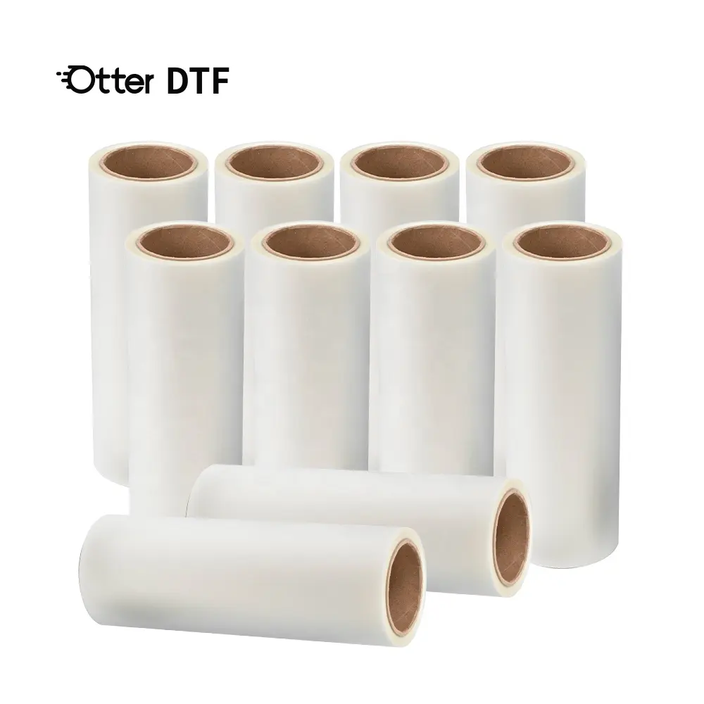 Otter DTF สองด้านเคลือบ DTF ฟิล์มสัตว์เลี้ยงม้วนไล่โทนสีเงินทองแวววาวในฟิล์ม Dtf  Dark