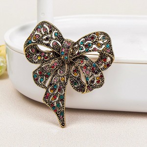 Broche de Aleación de Lujo con Forma de Lazo, Estilo Europeo Americano, Chic y Moderno, con Incrustaciones de Diamantes de Imitación Coloridos, Unisex, para Bodas - Product Image 1