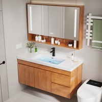 Meuble mural personnalisable haut de gamme en bois avec lavabo en céramique, miroir et rangement multi-tiroirs pour la rénovation de salles de bain de luxe
