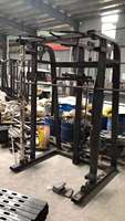 Équipement de musculation multifonction pour la maison : Machine Smith avec câble de traction, Cage de musculation robuste multifonction