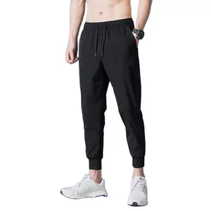 Moda logotipo personalizado desgaste ginásio calças esportivas ao ar livre gelo seda calças masculinas soltas homens casual esporte longo jogger pants