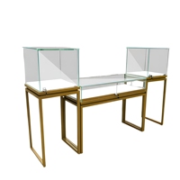 Vitrine de présentation épurée en acier inoxydable de qualité supérieure avec éclairage LED intégré pour bijouterie et showroom de vente au détail