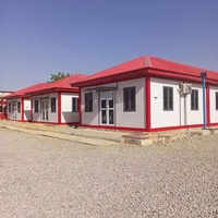 Maison conteneur préfabriquée modulaire portable à plat, grande, à un étage, facile à assembler, pour camp de travailleurs
