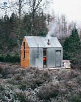 Kits de maisons préfabriquées compactes à structure en acier résistant au vent, fournis directement par l'usine, pour l'agrotourisme rural, les maisons d'appoint et les logements modulaires.