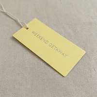 Étiquettes en tissu personnalisées en gros à faible quantité minimale de commande et étiquettes volantes pour vêtements, accessoires vestimentaires