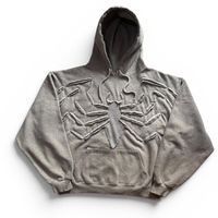 Sweat à capuche unisexe OEM en coton 100% de haute qualité, style streetwear, avec patchs déchirés, motif araignée et découpes, idéal pour l'hiver, écologique